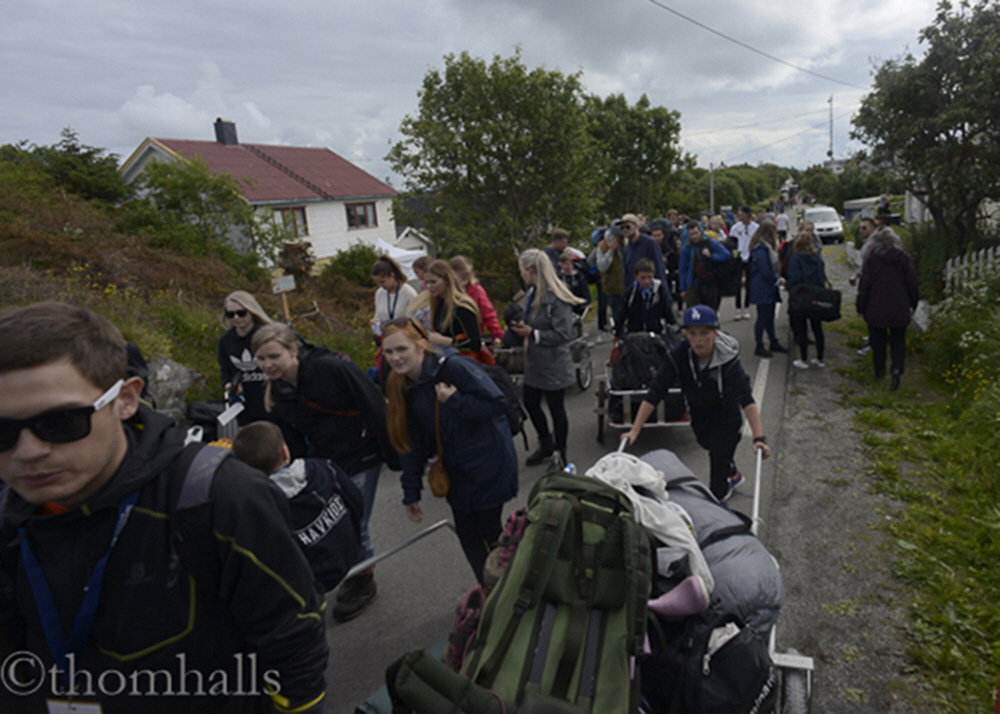 Early in the week the ferries arrive with people who have bought their tickets months in advance. The children of the island make hundreds of dollars hauling luggage and camping equipment to the campgrounds on the west side of the island.