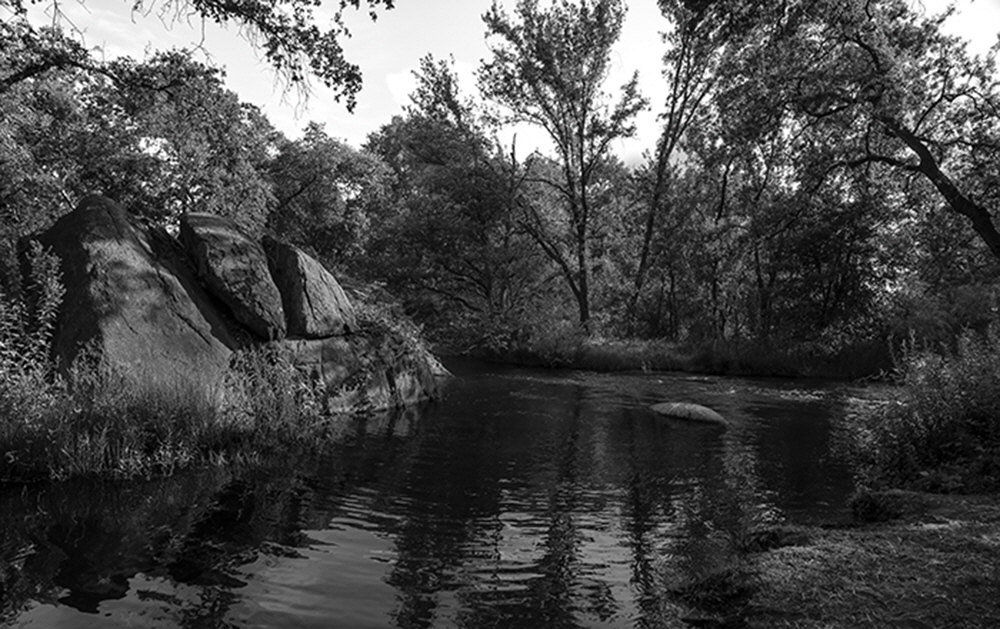 A small swimming hole with granite outcroppings, used first by Native Americans and then early settlers to the region.