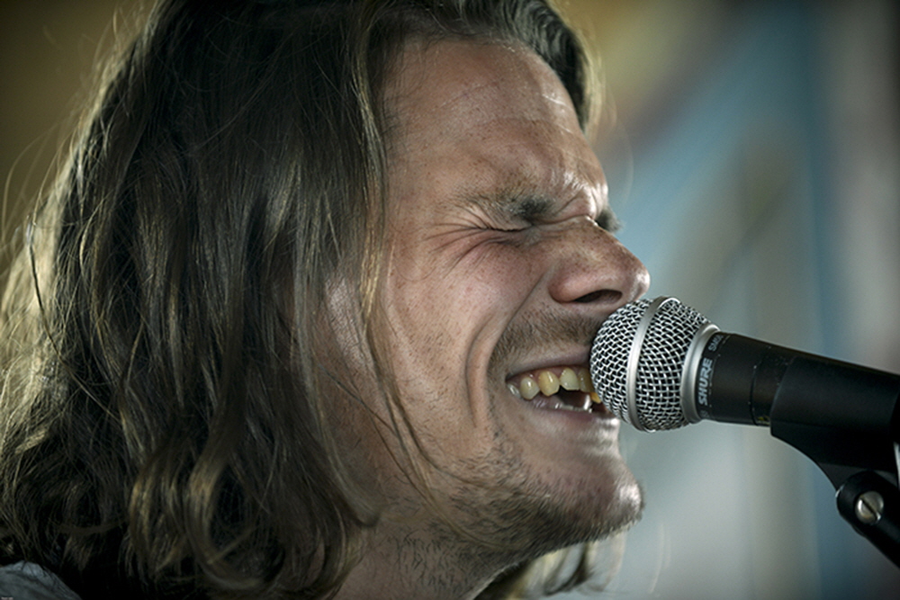 Folk artist NOHR shows the intensity of his music during this Friday morning concert.  During the festival, concerts continue from early in the morning until 1 or 2 am.